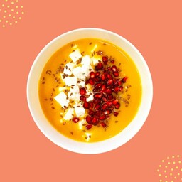 Vellutata di zucca con melograno, feta e semi di lino